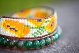 California Poppy beaded wrap bracelet with green mica.