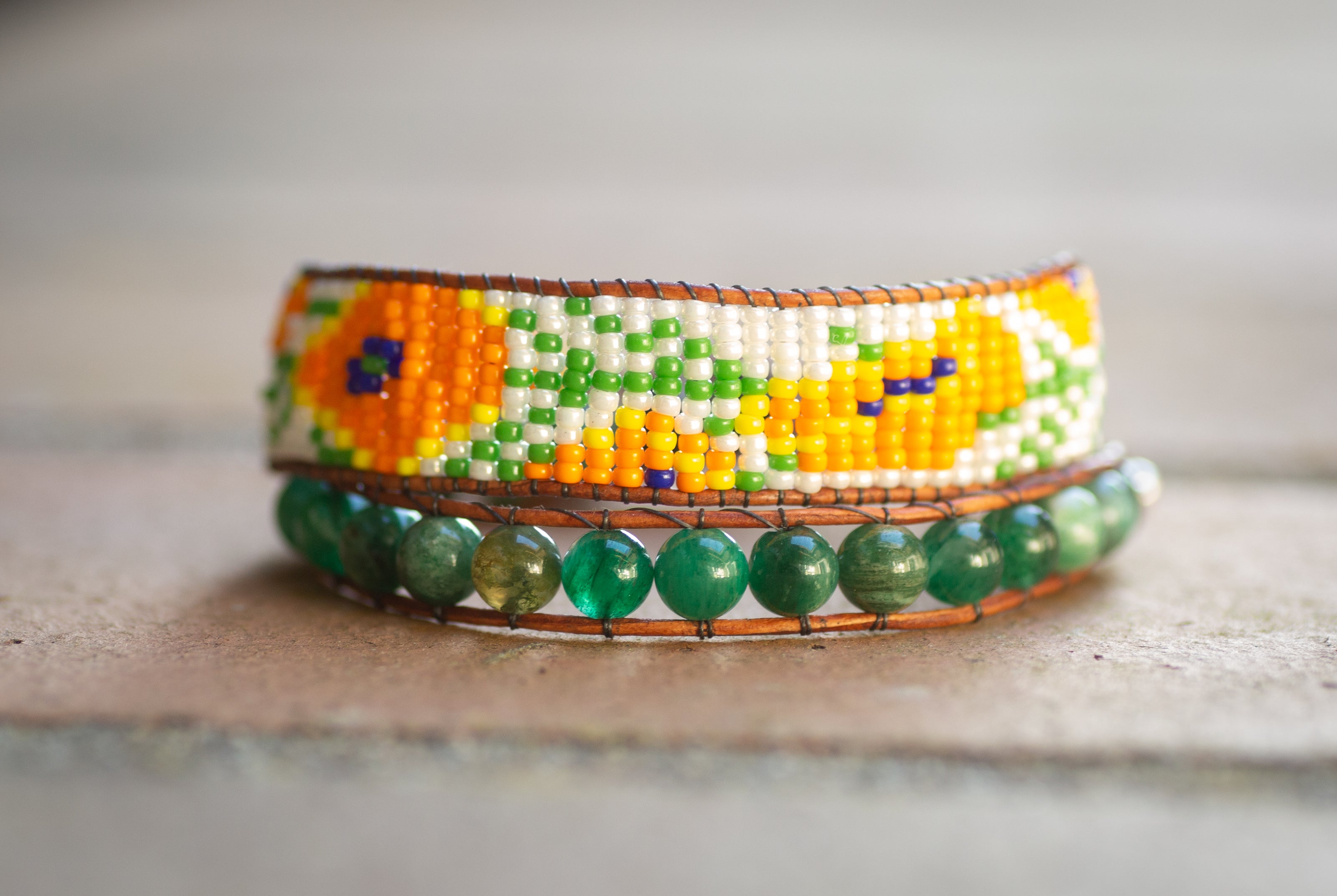 A fun California poppy beaded double wrap bracelet, handmade by NorthPeak Silver and Beadwork. 