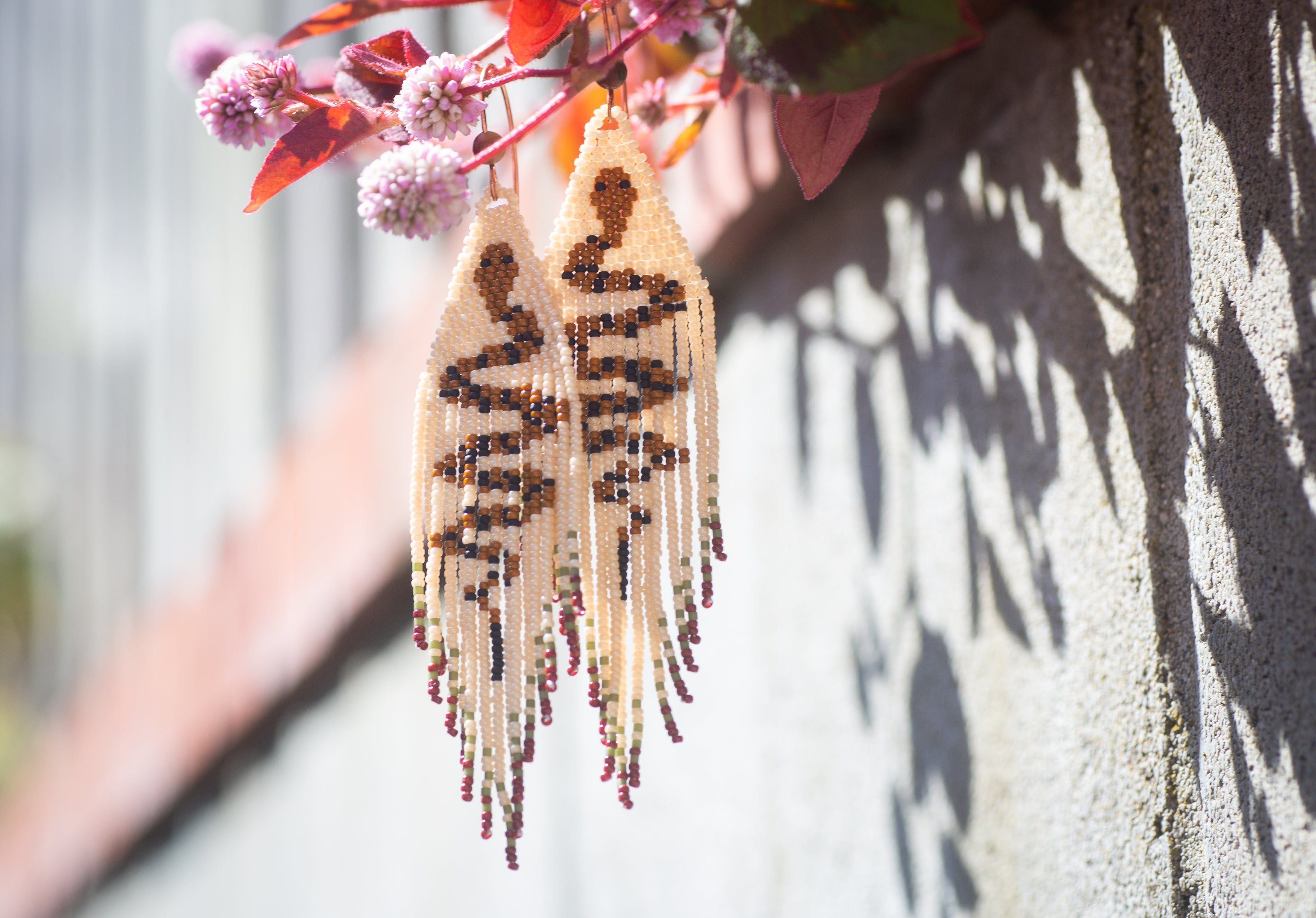 Rattlesnake beaded fringe earrings with copper ear hooks