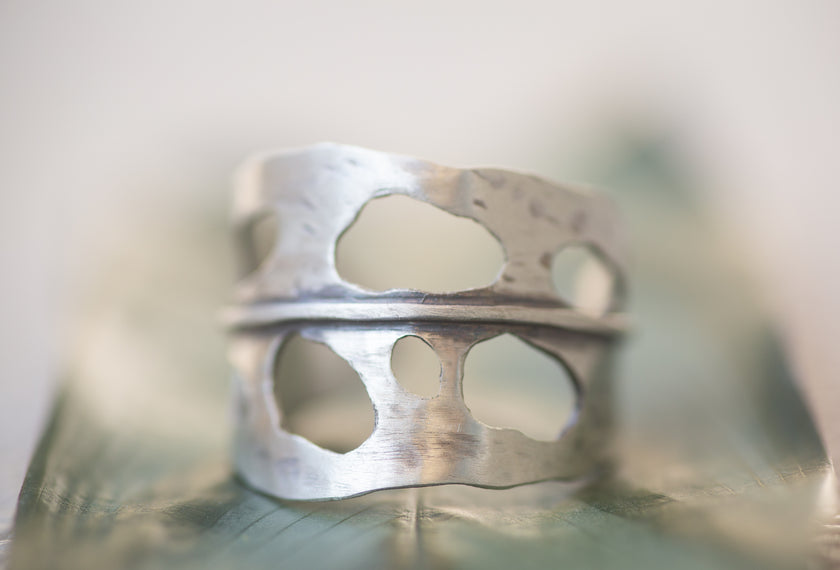Sterling Silver adjustable handmade ring that looks like a Monstera Leaf, aka swiss cheese plant. 