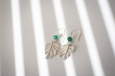 Sterling Silver Monstera Deliciosa leaf earrings, handmade with Green Mica beads. 