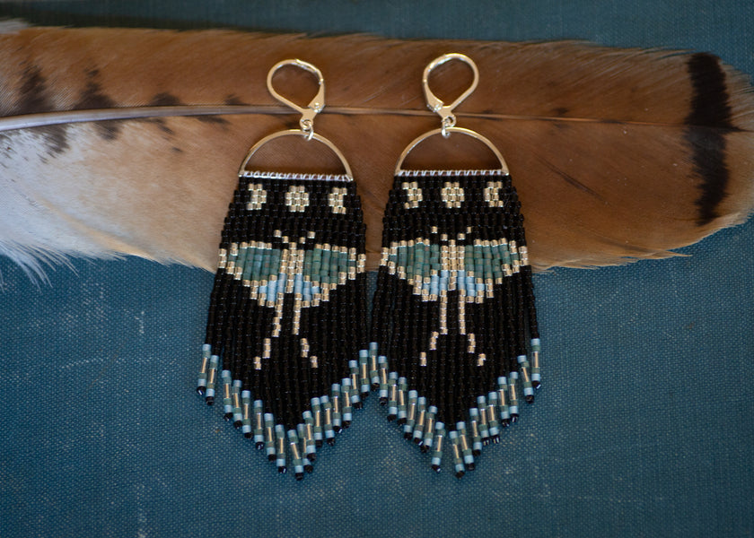 Luna moth beaded fringe earrings in silver, black, green, and blue with sterling silver plated ear hooks. 