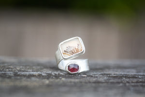 Sterling silver ring with a natural dendritic agate and a small oval garnet. 