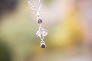 Handmade sterling silver pendant and chain with a dendritic agate doublet and smokey quartz. 